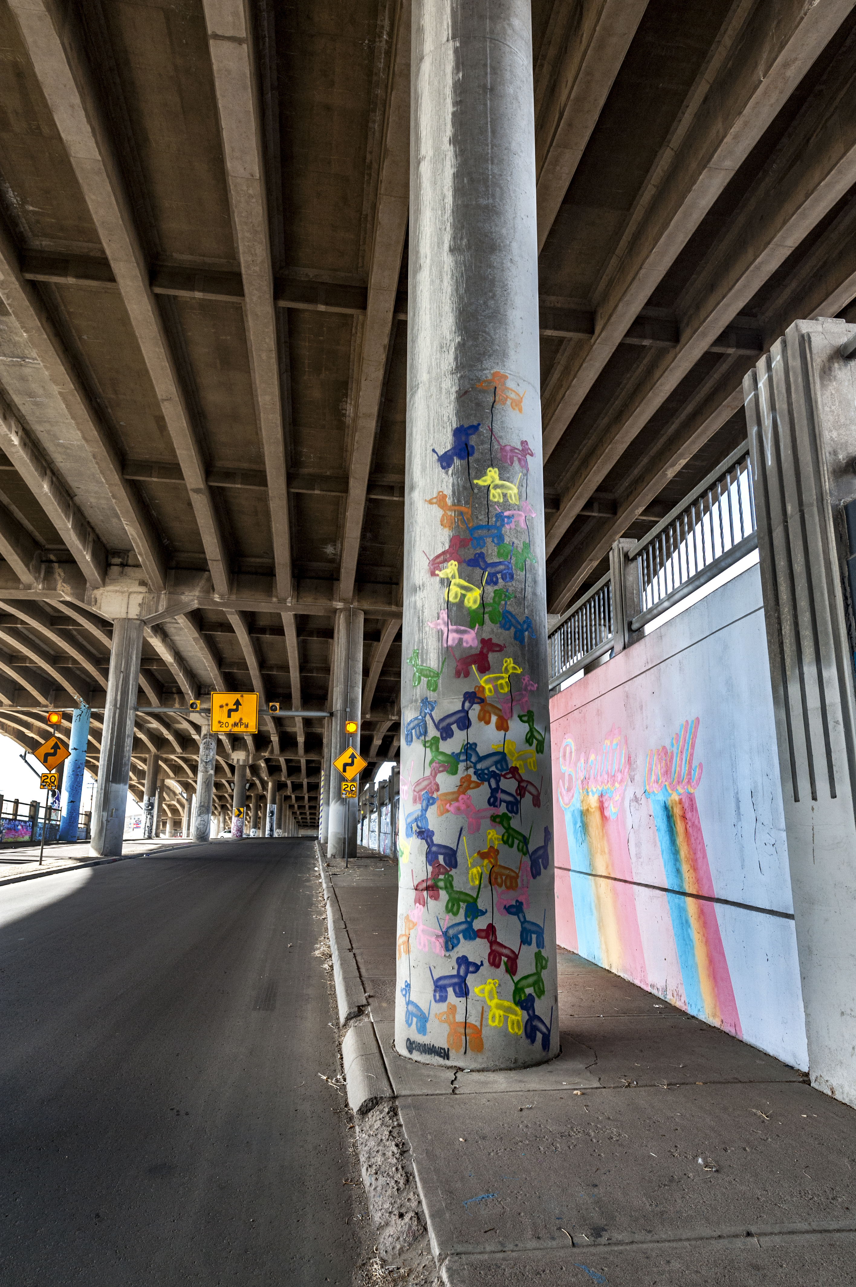 Untitled (colorful concrete columns painted under I-70)