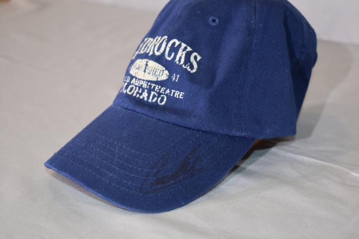 Red Rocks Souvenir (Dark Blue) -Signed by Carlos Mencia 