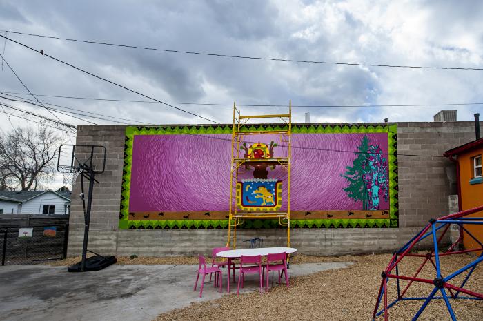 Untitled (fuchsia-colored mural with Aztec images)