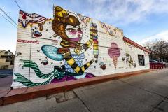 Untitled (a girl holding ice cream cone with many flavors) 