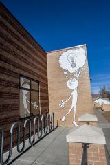 Untitled (boy reaching for a light bulb) 