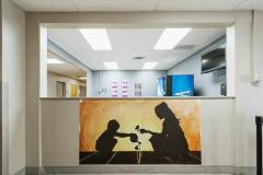 Untitled (mother and child watering a plant)